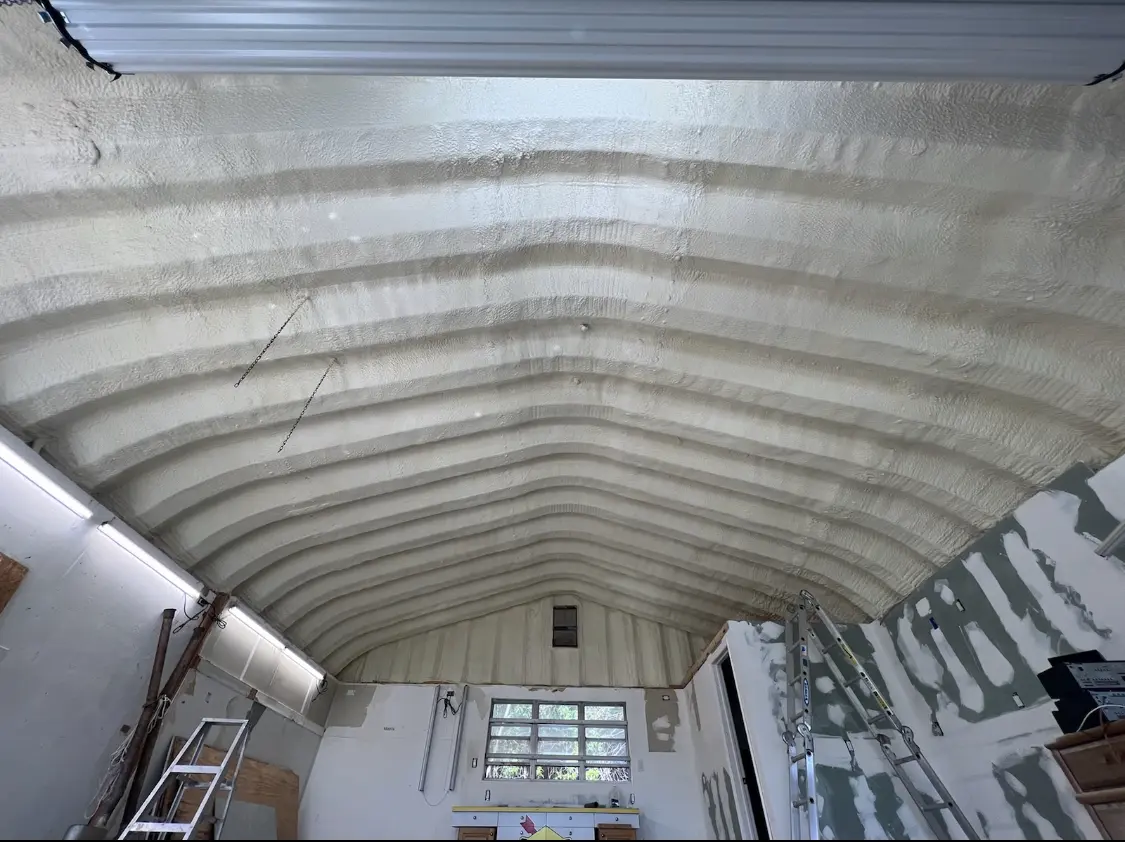 Spray polyurethane foam applied to the underside of a metal roof deck in Willowbrook